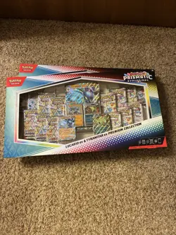 Pokemon TCG Prismatic Evolutions Lucario Ex + Tyranitar Ex Premium Collection - Image 1