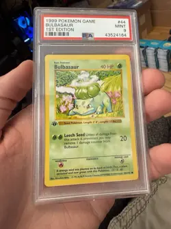 1999 POKEMON BASE SET 1ST EDITION #44 BULBASAUR PSA 9 - Image 1