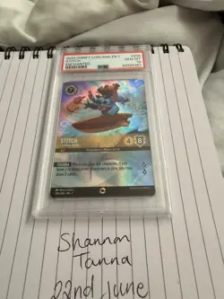 Lorcana Stitch Carefree Surfer Enchanted First Chapter Psa 10. Offers welcome - Image 1