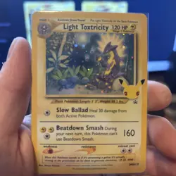 Light Toxtricity SWSH137 SWSH: Sword & Shield Promo Cards Holo - Image 1