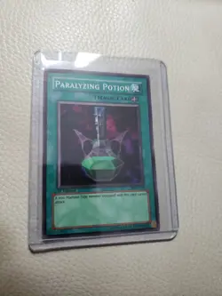 Yugioh! Metal Raiders 1st Edition Paralyzing Potion MRD-137 Near Mint - Image 1