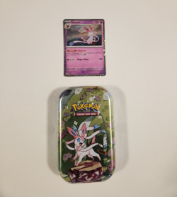 Pokemon Prismatic Evolutions Sylveon TCG Mini Tin Sealed Plus Sylveon Foil Card - Image 1