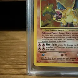 1999 POKEMON BASE SET UNLIMITED #4 CHARIZARD-HOLO PSA NM 7 - Image 5