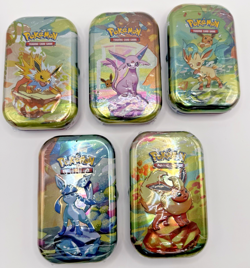 Pokemon TCG Prismatic Evolutions Mini Tin – Factory Sealed (Random Tin) - Image 1