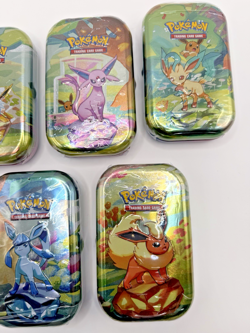 Pokemon TCG Prismatic Evolutions Mini Tin – Factory Sealed (Random Tin) - Image 3