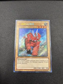 *** SABERSAURUS *** 1ST EDITION SECRET RARE LCJW-EN143 YUGIOH! A6 - Image 1