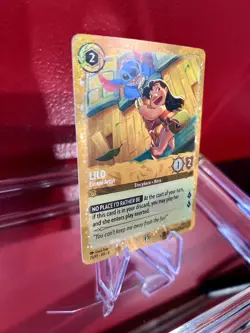 Lorcana - Lilo: Escape Artist 25/P2 Promo Gold Foil - Lilo & Stitch Gift Box Set - Image 3