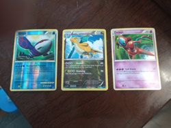 Deoxys, Kyogre, and Dragnite Pokemon Cards Three Card Lot - Image 1