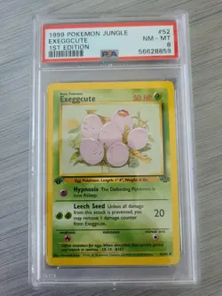 Pokemon Jungle 1st Edition #52 Exeggcute PSA 8 - Image 1