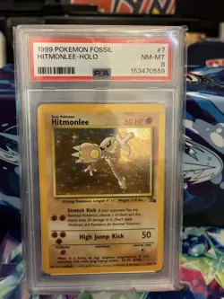 Pokemon Hitmonlee Fossil Unlimited Holo Rare #7 PSA 8 - Image 1
