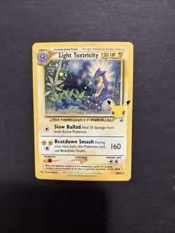 Light Toxtricity SWSH137 Black Star Promo 25th Celebrations Pokemon Holo LP - Image 1