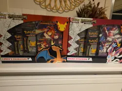 Pokemon TCG 25th Celebrations Lance's Charizard V & Dark Sylveon V Box Brand New - Image 1