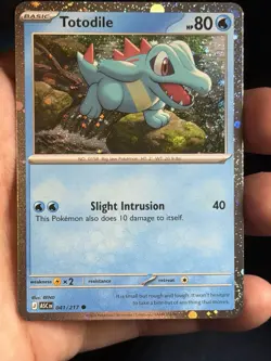 Swirl Totodile 041/217 Ascended Heros Cosmos Holo Promo Pokemon TCG NM - Image 1