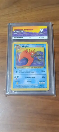 1999 POKEMON FOSSIL 1ST ED #38 KINGLER PSA 9 - Image 1