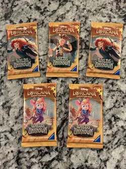 Ravensburger Disney Lorcana TCG Wilds of the Unknown 5 Booster Packs (12) - Image 1