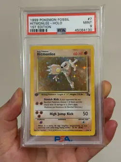 1999 Pokemon Fossil Hitmonlee Holo #7 1st Edition PSA 9 Mint – Vintage WOTC - Image 1