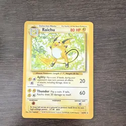 Pokemon TCG Raichu 14/102 Base Set Unlimited Rare Holo Vintage Card - Image 1