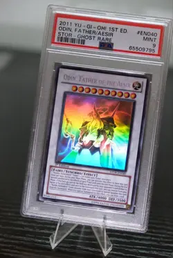 YuGiOh Odin, Father of the Aesir STOR-EN040 Storm of Ragnarok Ghost 1st Ed PSA 9 - Image 1