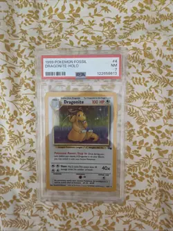 Dragonite Fossil Holo Rare Card 4/62 PSA 7 - Image 1