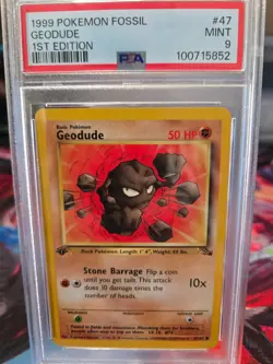 1999 Pokemon Fossil Geodude 1st Edition 47/62 PSA 9 MINT - Image 1