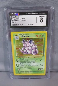 NIDOKING #11/102 Pokemon Base Set HOLO 1999 CGC 8 Near Mint/Mint - Image 1