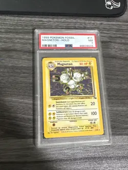 1999 Pokemon Fossil #11 Magneton Holo PSA 7 - Image 1