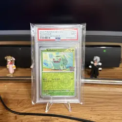 2023 POKEMON MEW EN-151 BEST BUY EXCLUSIVE #001/165 BULBASAUR PSA 9 - Image 1