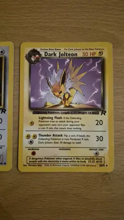 Pokemon TCG Team Rocket Bundle Dark Jolteon and Eevee - Image 1