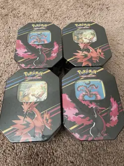 Crown Zenith Pokemon sealed Tins lot x4 (2xMoltres, 2xZapdos) - Image 1