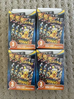 Pokemon Surging Sparks Booster Packs (12 Packs) Sealed - Image 1