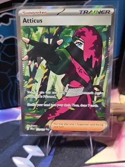 Pokemon TCG Atticus Trainer Prismatic Evolutions Ultra Rare Card 133/131 - Image 1