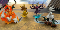 Pokemon 4 Figure Lot - Reshiram Charizard Alolan Raichu Shining Darkrai Silvally - Image 1