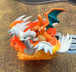 Pokemon 4 Figure Lot - Reshiram Charizard Alolan Raichu Shining Darkrai Silvally - Image 2