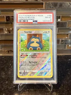 Pokemon - Snorlax - 158/214 - Sun & Moon Unbroken Bonds - Reverse Holo PSA 8 - Image 1