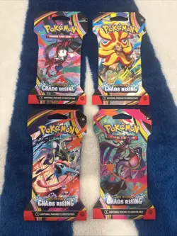 Pokemon TCG: Chaos Rising Sleeved Booster Pack Art Set 4 Pack Set - Image 1