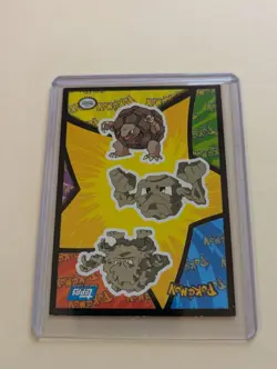 1999 Topps Pokemon Sticker Puzzle Card Geodude Graveler Golem Blue Logo - Image 1