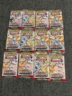 12 Pokemon Prismatic Evolutions Sealed Booster Pack Lot - Image 1