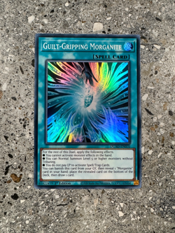 Yugioh TCG Guilt-Gripping Morganite DUAD-EN070 Super Rare 1st Edition EU NM-M - Image 1