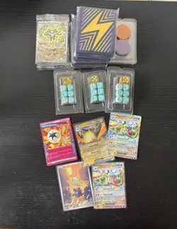 Pokemon Surging Sparks Pokemon TCG Player's Guide w/ Card Lot, Sleeves & Dice - Image 4