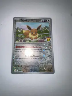 Eevee - (Pokemon Day 2025) (Reverse Cosmos Holo) 074/131 - Image 1