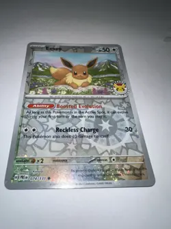 Eevee - (Pokemon Day 2025) (Reverse Cosmos Holo) 074/131 - Image 2