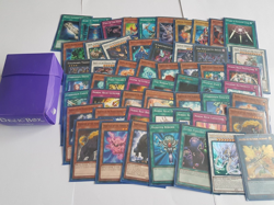 Bundle Of X55 Yu Gi Oh Cards Nordic Set Mainly Purple Deck Box Card Protectors - Image 1