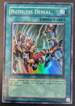Yugioh TCG - 1x Ruthless Denial - DP04-EN024 - NM/LP - Super Rare - 2007 Unlim. - Image 1