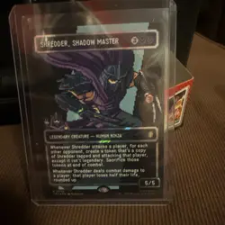 Shredder, Shadow Master (Borderless) (Surge Foil) Commander: Teenage Mutant... - Image 1