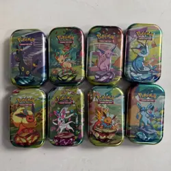Pokemon Scarlet and Violet: Prismatic Evolutions Mini Tin Boxes - Lot of 8 - Image 1