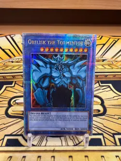 Yugioh Obelisk Der Peiniger LC01-EN001 Quarter Century Secret Rare - Image 1