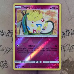 Togepi 136/214 SM Unbroken Bonds Reverse Holo NM Pokemon Card English - Image 1