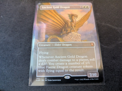 MTG Magic the Gathering Ancient Gold Dragon Borderless CLB! - Image 1