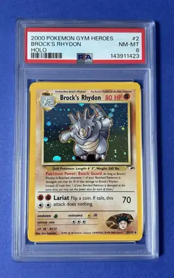 2000 Pokemon Gym Heroes Brock’s Rhydon Holo #2 PSA 8 NM-MT - Image 1