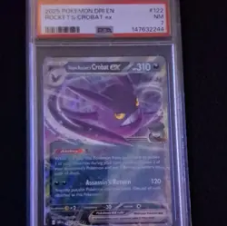 The Pokemon Company PSA 7 Team Rocket's Crobat ex 122/182 SV10 Holo 2025 - Image 1